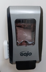 Gojo FMX-20 dispenser with the Universal Dispenser Beacon mounted on the left side
