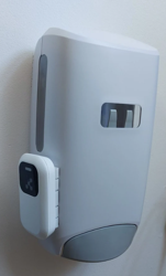 Universal Dispenser Beacon installed on an Ecolab Nexa Classic Manual dispenser, seen from the front